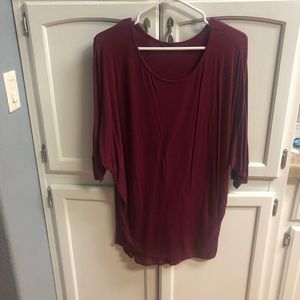 Woman’s maroon shirt, buy two more $10 or $15 items for $20